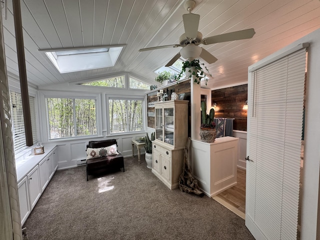 338 Tower Rd, Albrightsville, PA 18210 - sunroom / solarium with a skylight, wood ceiling, lofted ceiling, wooden walls, and carpet floors