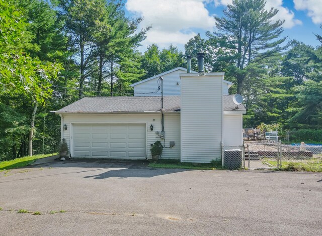 1219 Sherwood Forest Rd, Stroudsburg, PA 18360 - garage featuring aphalt driveway