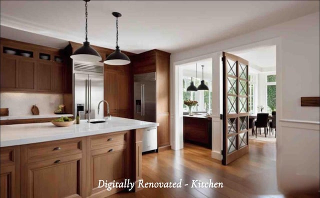 1219 Sherwood Forest Rd, Stroudsburg, PA 18360 - kitchen with glass insert cabinets, light countertops, and stainless steel built in fridge