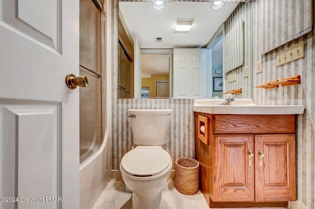 full bathroom featuring wallpapered walls, a bathing tub, a shower, and vanity