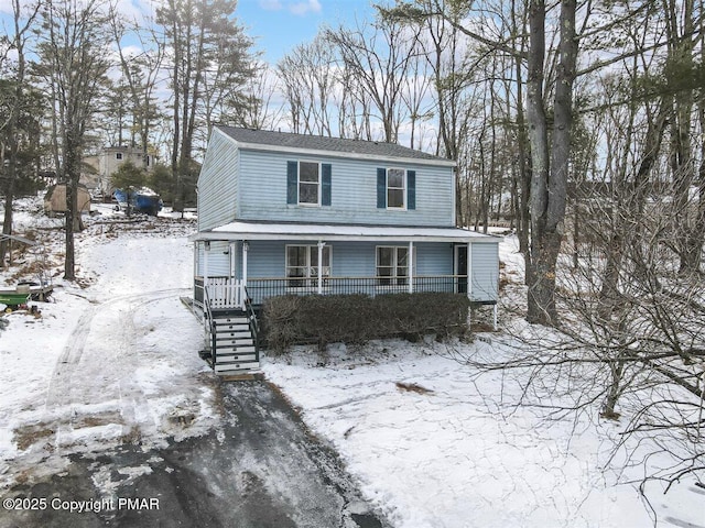 view of front of home featuring covered porch