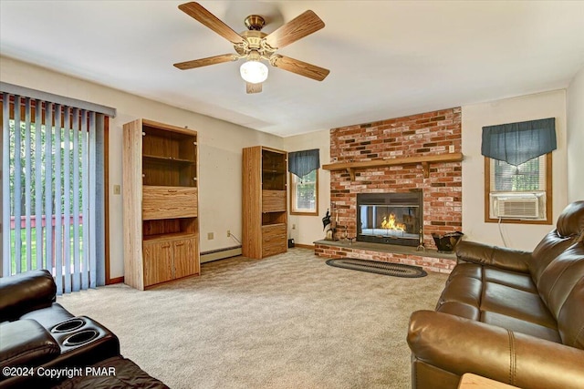 carpeted living area featuring a baseboard radiator, a fireplace, ceiling fan, and a wealth of natural light