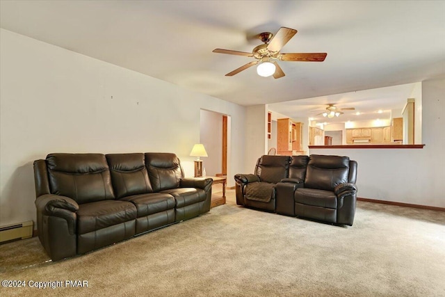 carpeted living room with baseboards, baseboard heating, and a ceiling fan