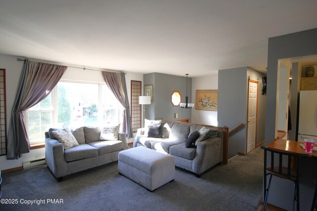 living room featuring carpet floors and baseboard heating