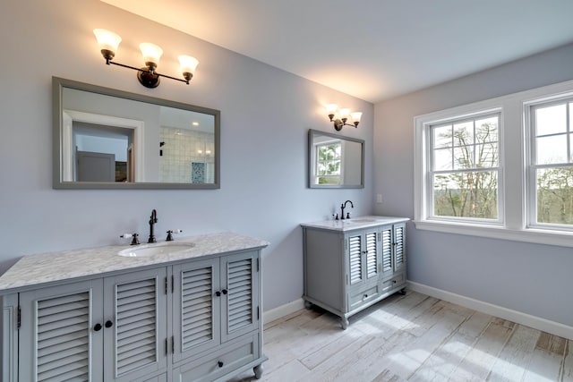 5126 Beattys Cir, Buck Hill Falls, PA 18323 - full bath featuring two vanities and wood finished floors