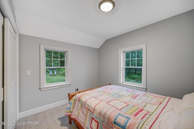 5126 Beattys Cir, Buck Hill Falls, PA 18323 - bedroom featuring multiple windows and vaulted ceiling