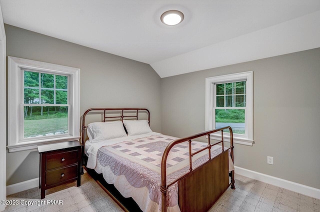 5126 Beattys Cir, Buck Hill Falls, PA 18323 - bedroom featuring multiple windows and vaulted ceiling