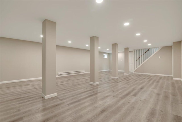 7 Eagle Ct, Lake Ariel, PA 18436 - finished basement featuring a baseboard heating unit, light wood-style floors, baseboards, recessed lighting, and stairs