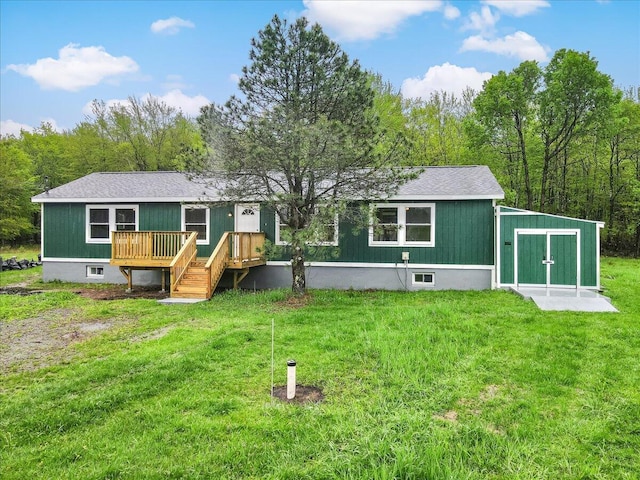 7 Eagle Ct, Lake Ariel, PA 18436 - rear view of house featuring a yard, a deck, and a shingled roof