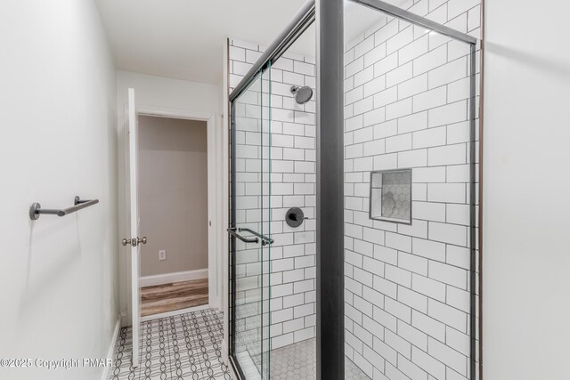 3011 Minqua Cir, Tobyhanna, PA 18466 - full bathroom featuring a stall shower and baseboards