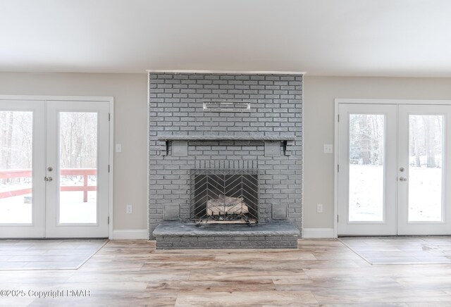 3011 Minqua Cir, Tobyhanna, PA 18466 - unfurnished living room with french doors and wood finished floors