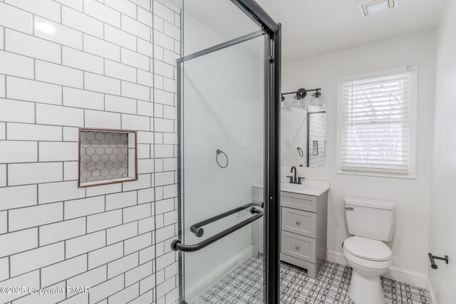 3011 Minqua Cir, Tobyhanna, PA 18466 - bathroom with toilet, vanity, a stall shower, and baseboards