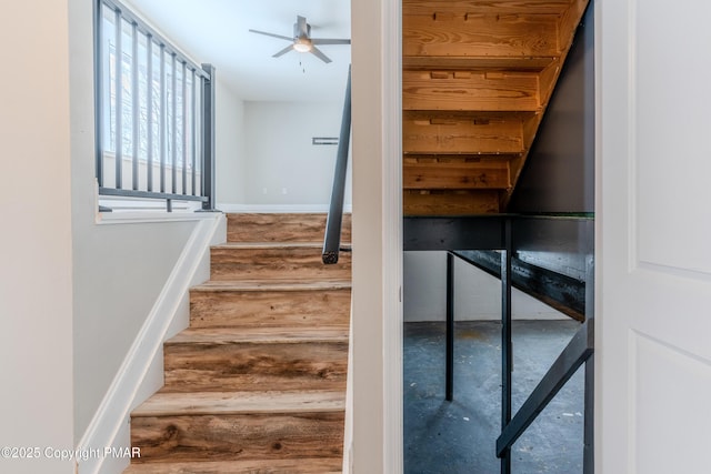 3011 Minqua Cir, Tobyhanna, PA 18466 - stairs with baseboards, a ceiling fan, and wood finished floors