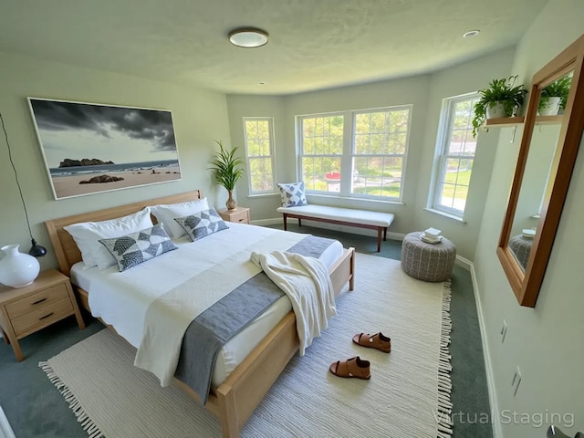 130 Sugar Hill Rd, Saylorsburg, PA 18353 - carpeted bedroom featuring baseboards and multiple windows