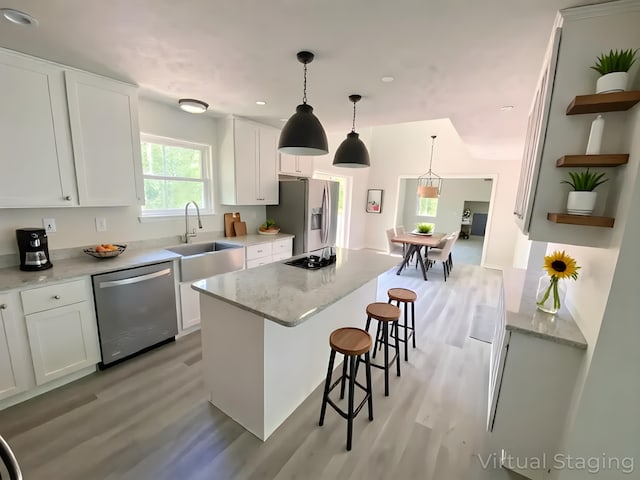 130 Sugar Hill Rd, Saylorsburg, PA 18353 - kitchen featuring appliances with stainless steel finishes, a sink, open shelves, light wood finished floors, and recessed lighting