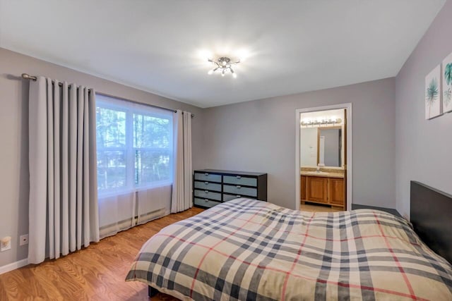 295 Wyomissing Dr, Pocono Lake, PA 18347 - bedroom with light wood-type flooring and ensuite bathroom