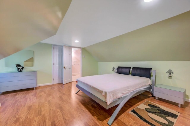 295 Wyomissing Dr, Pocono Lake, PA 18347 - bedroom featuring wood finished floors, lofted ceiling, and recessed lighting