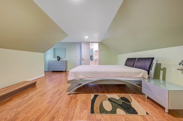 295 Wyomissing Dr, Pocono Lake, PA 18347 - bedroom featuring wood finished floors, vaulted ceiling, and recessed lighting