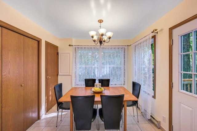 295 Wyomissing Dr, Pocono Lake, PA 18347 - dining area with a chandelier and light tile patterned flooring