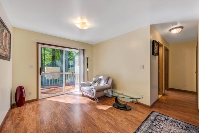 295 Wyomissing Dr, Pocono Lake, PA 18347 - sitting room with wood finished floors and baseboards
