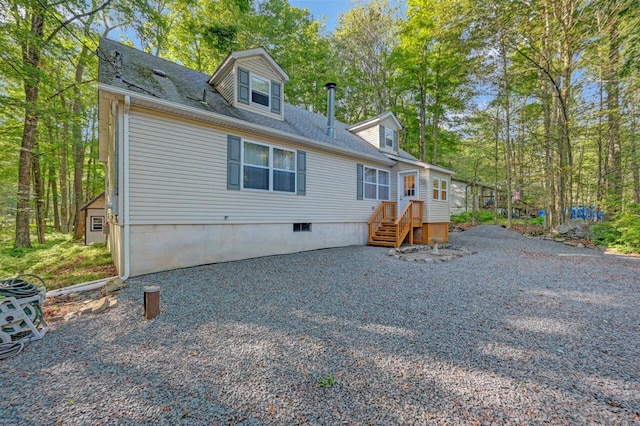 295 Wyomissing Dr, Pocono Lake, PA 18347 - back of property with a shingled roof