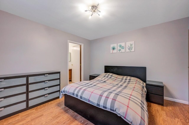 295 Wyomissing Dr, Pocono Lake, PA 18347 - bedroom with wood finished floors and baseboards