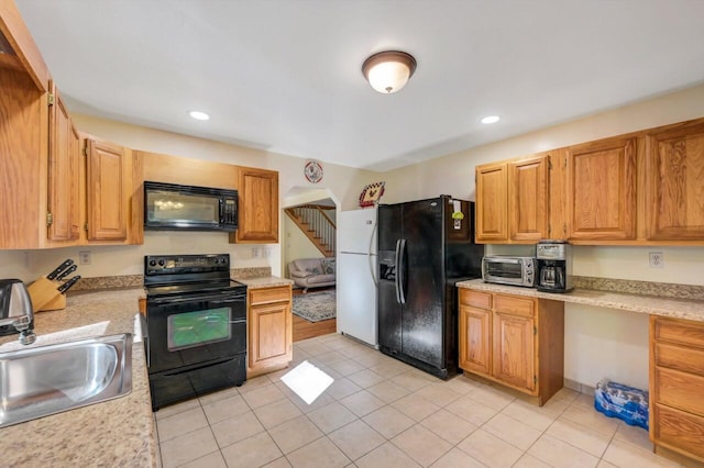 295 Wyomissing Dr, Pocono Lake, PA 18347 - kitchen with black appliances, light countertops, light tile patterned floors, and recessed lighting