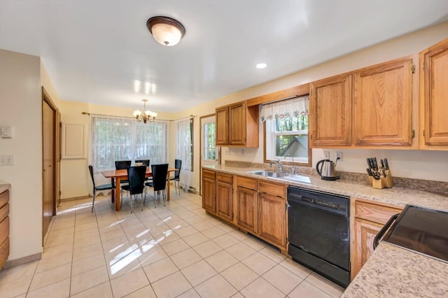 295 Wyomissing Dr, Pocono Lake, PA 18347 - kitchen with black appliances, a chandelier, light countertops, light tile patterned floors, and pendant lighting