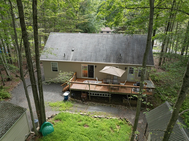 295 Wyomissing Dr, Pocono Lake, PA 18347 - rear view of house with a deck and roof with shingles