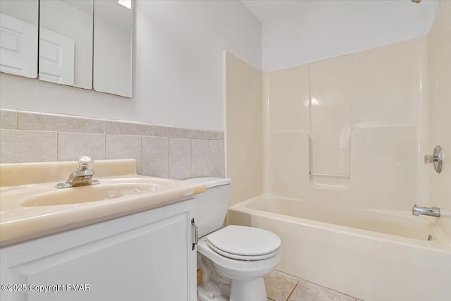 full bathroom featuring vanity, tile patterned floors, shower / bathtub combination, and toilet