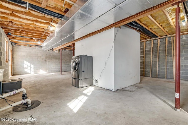 basement featuring washing machine and dryer