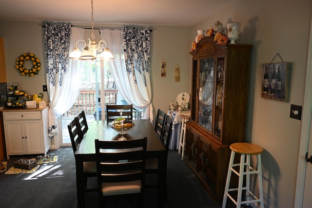 1617 Academy Dr, East Stroudsburg, PA 18301 - dining area with a chandelier and dark colored carpet