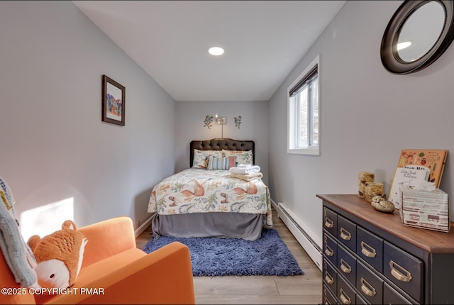 3126 Snowden Dr, Bushkill, PA 18324 - bedroom with baseboard heating, light wood-style flooring, and recessed lighting