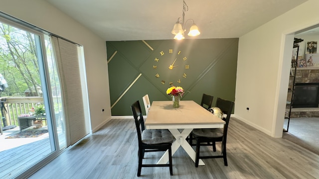 2292 Bismark Rd, Blakeslee, PA 18610 - dining room with a chandelier, wood finished floors, and baseboards