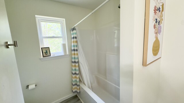 2292 Bismark Rd, Blakeslee, PA 18610 - full bathroom featuring shower / tub combo with curtain and baseboards