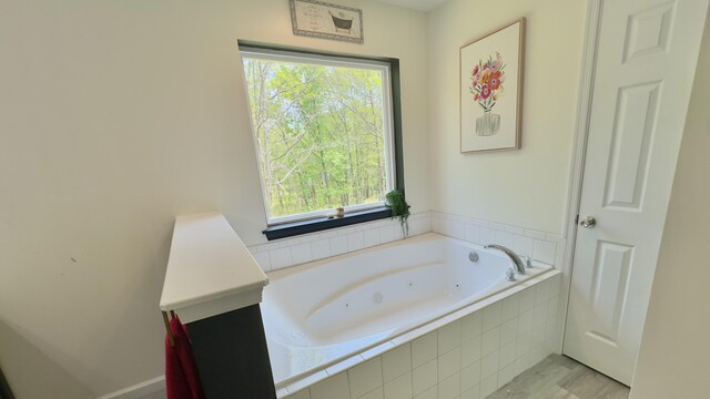 2292 Bismark Rd, Blakeslee, PA 18610 - bathroom with a tub with jets and wood finished floors