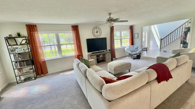 2292 Bismark Rd, Blakeslee, PA 18610 - carpeted living room with a ceiling fan, baseboards, and stairs