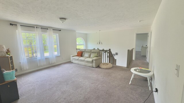 2292 Bismark Rd, Blakeslee, PA 18610 - carpeted living area with a textured ceiling