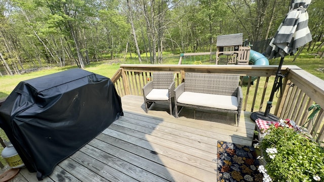2292 Bismark Rd, Blakeslee, PA 18610 - wooden deck with a grill and a playground