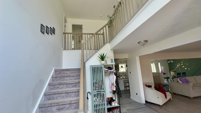 2292 Bismark Rd, Blakeslee, PA 18610 - staircase featuring baseboards and wood finished floors