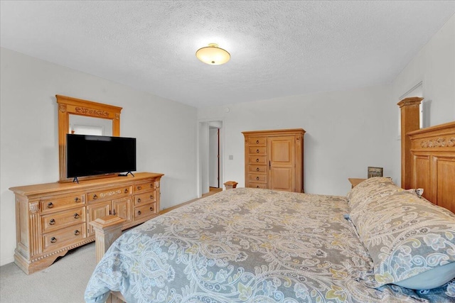 96 Wolf Hollow Rd, Lake Harmony, PA 18624 - bedroom with light colored carpet and a textured ceiling