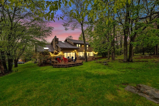 96 Wolf Hollow Rd, Lake Harmony, PA 18624 - view of grassy yard featuring a wooden deck