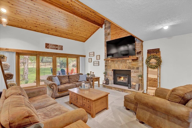 96 Wolf Hollow Rd, Lake Harmony, PA 18624 - living area featuring light carpet, a stone fireplace, beam ceiling, and high vaulted ceiling