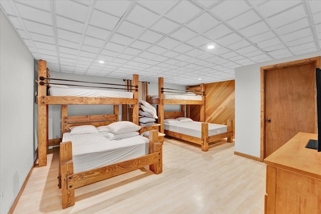 96 Wolf Hollow Rd, Lake Harmony, PA 18624 - bedroom with baseboards, wood finished floors, recessed lighting, and wood walls