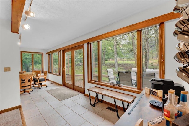96 Wolf Hollow Rd, Lake Harmony, PA 18624 - sunroom with french doors, healthy amount of natural light, baseboards, and a textured ceiling