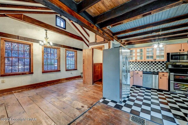 kitchen with tasteful backsplash, visible vents, lofted ceiling with beams, decorative light fixtures, and stainless steel appliances