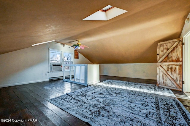 bonus room featuring cooling unit, a ceiling fan, baseboard heating, lofted ceiling with skylight, and wood-type flooring