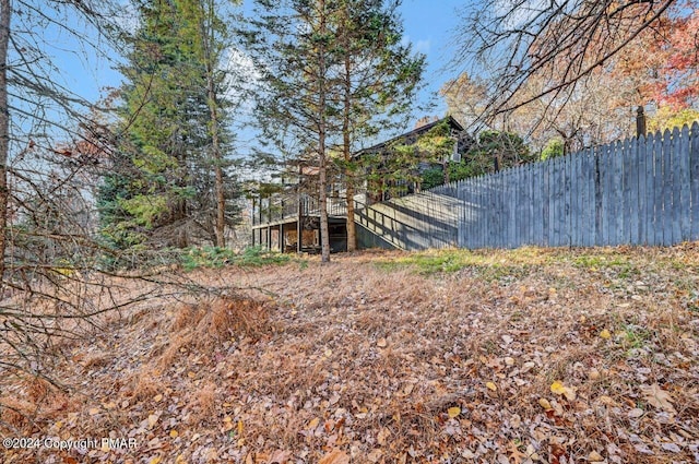 view of yard with fence