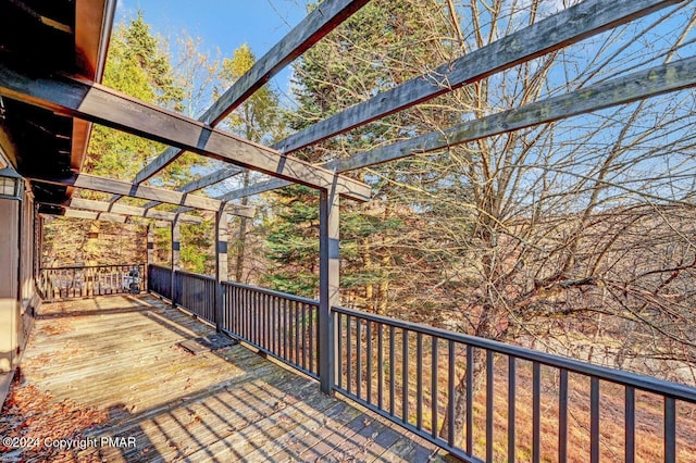 wooden terrace featuring a pergola