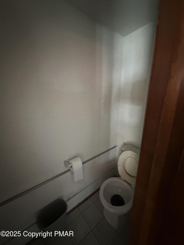 301 Tedrick St, Pittston, PA 18640 - bathroom featuring toilet and tile patterned flooring
